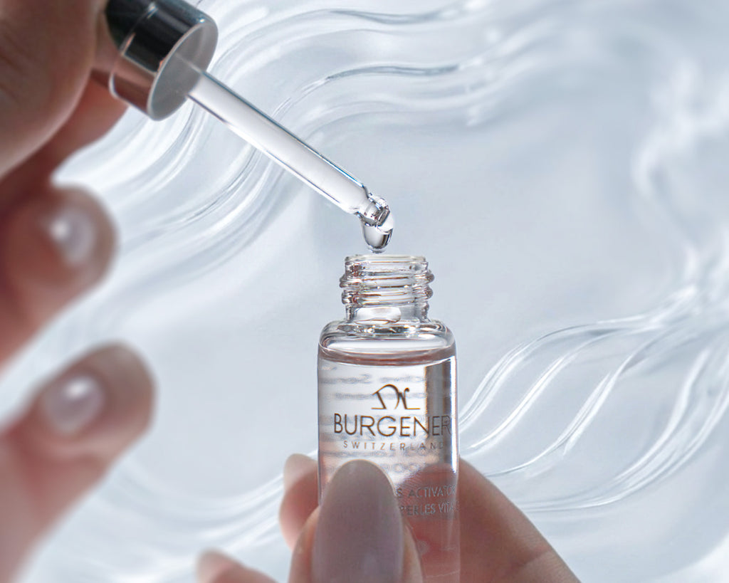 Dr Burgener bottle with dropper being used on a light background