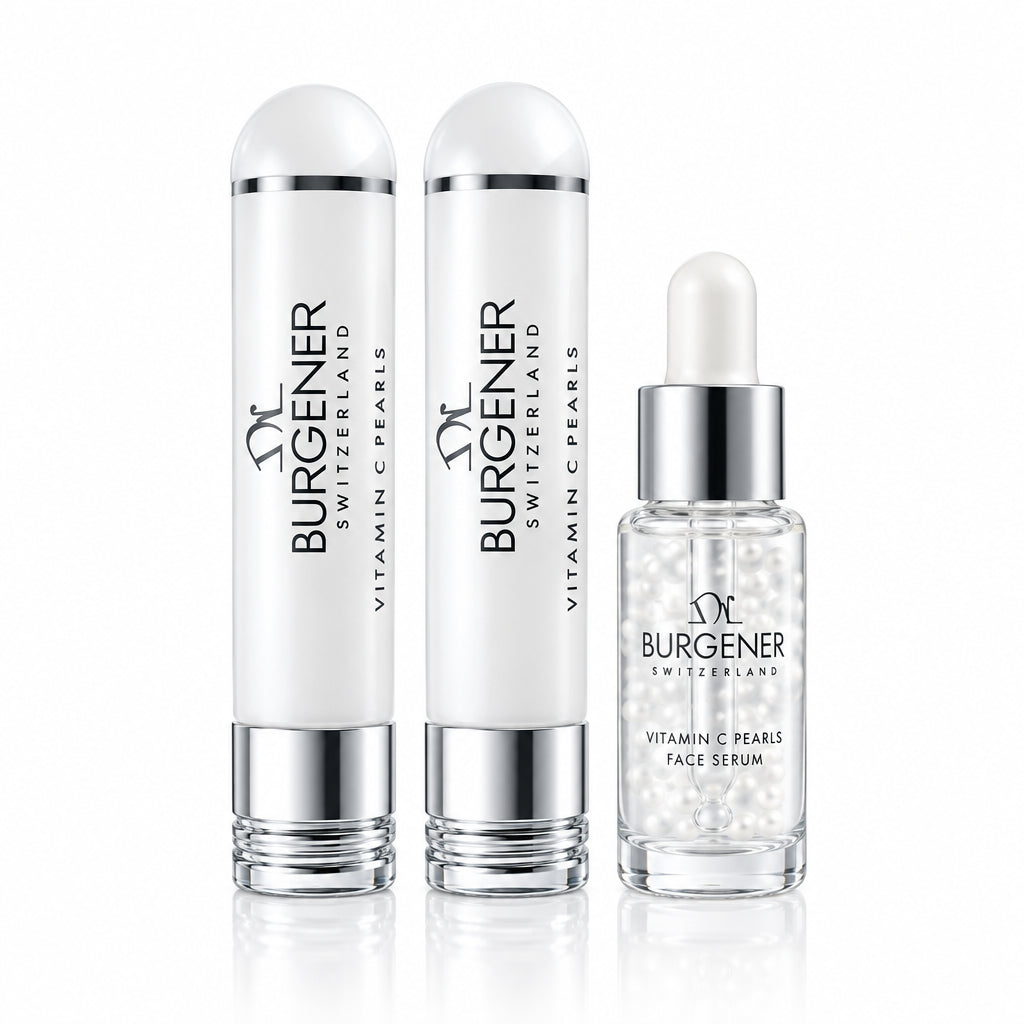 Dr Burgener Switzerland Vitamin C Pearls skincare products on a light fabric background