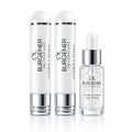 Dr Burgener Switzerland Vitamin C Pearls skincare products on a light fabric background