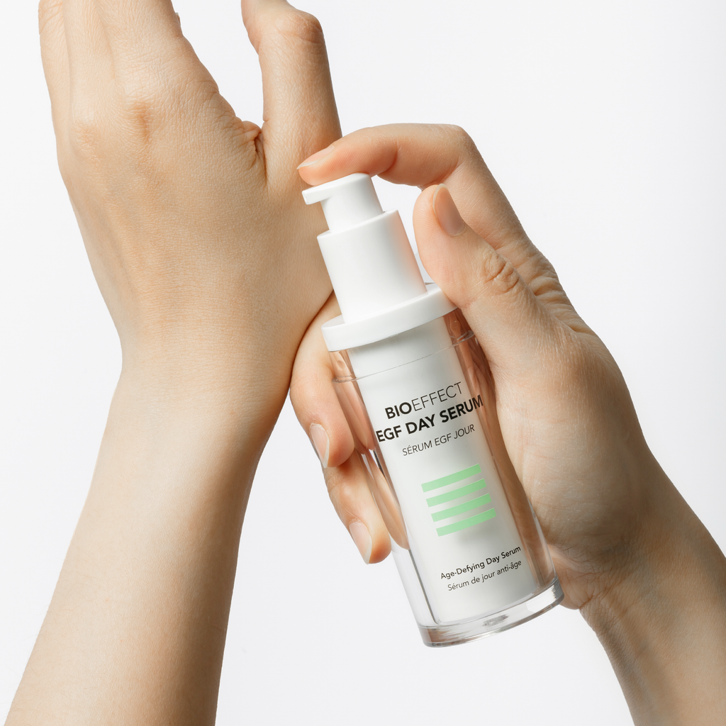 BIOEFFECT EGF Day Serum held by a hand against a neutral background
