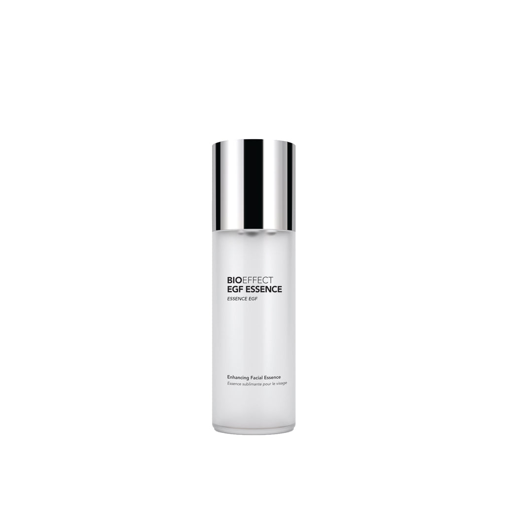 A clear cylindrical skincare bottle with a reflective silver cap, labeled 'BIOEFFECT BGF ESSENCE ENHANCE BGF' on a plain white background.