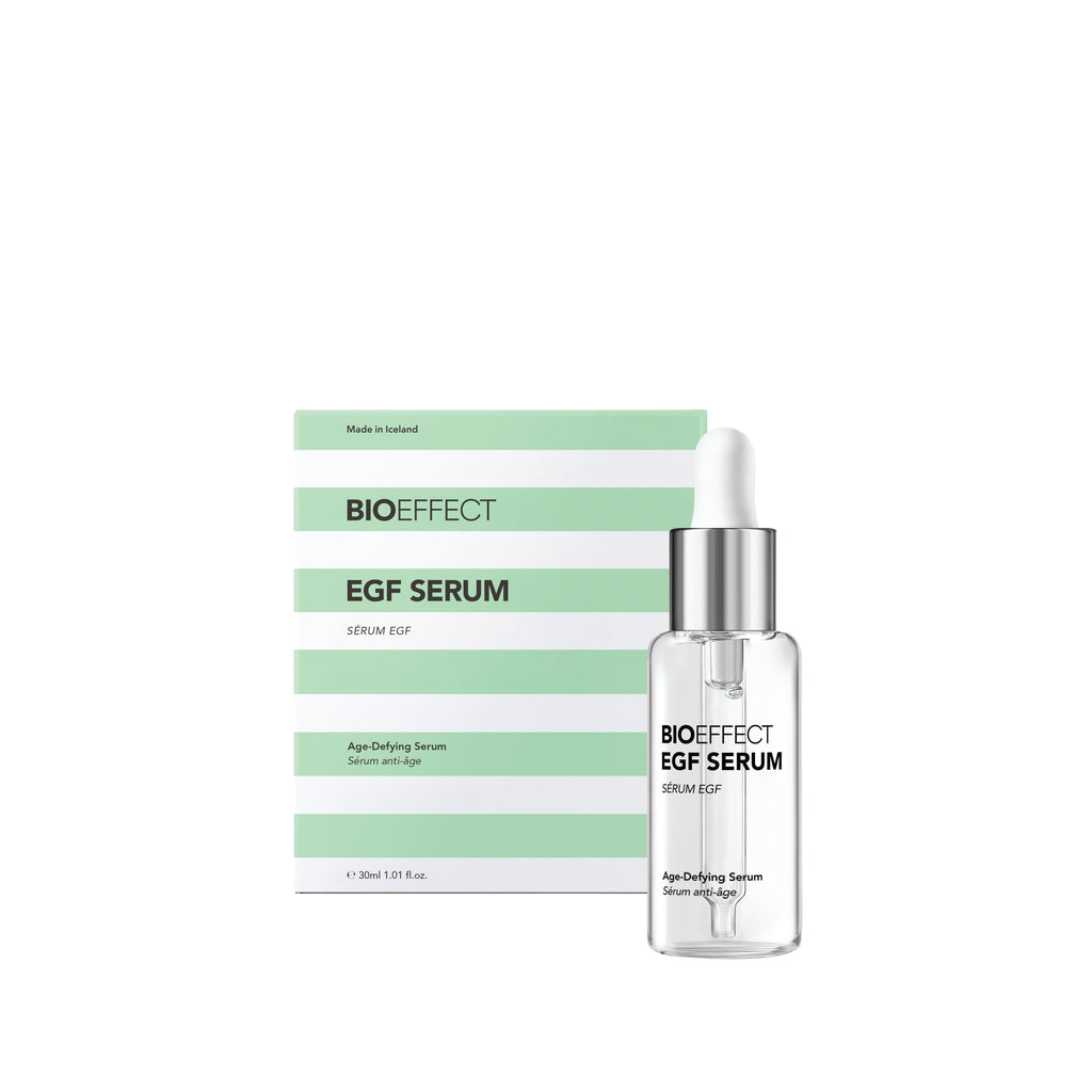 BIOEFFECT EGF Serum shown with its product box. The clear glass dropper bottle has a silver collar and white dropper top, standing next to a white and light green striped box.