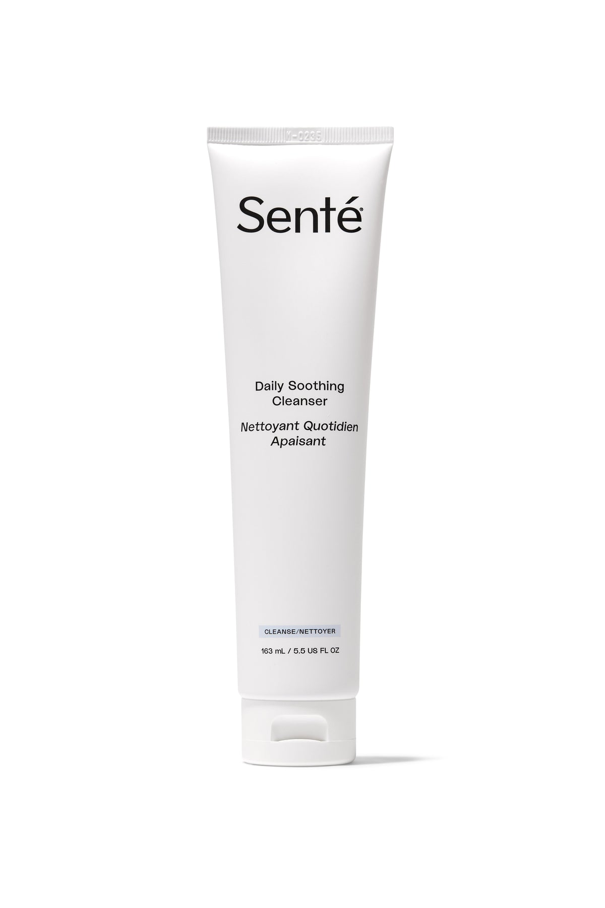 A white squeeze tube of Sente Daily Soothing Cleanser on a clean white background.