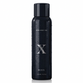 A black cylindrical bottle of Suzix Noir Body Oil with a silver 'X' logo, shown against a metallic gray background with abstract curved glass tubes.
