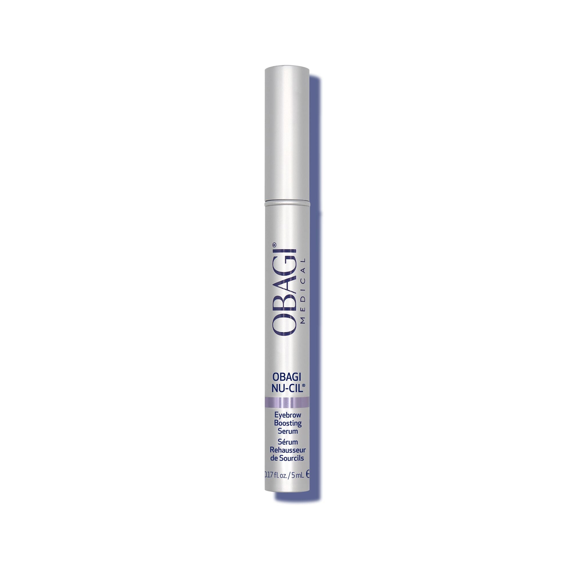 Obagi Nu-Cil Eyebrow Boosting Serum in a slim silver cylindrical tube with purple text, shown on a clean white background with a soft shadow.