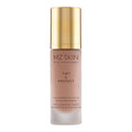 MZ SKIN Tint & Protect SPF 30 tinted moisturizer in a frosted glass bottle with a metallic gold cap, shown on a solid white background.
